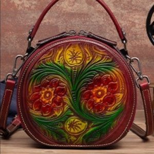 100% genuine leather with embossed floral feature